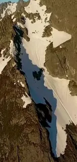 High-altitude view of snowy mountain peaks.