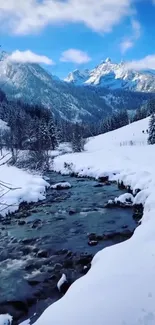 Snowy mountain stream with blue skies and snowy banks.