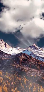 Snowy mountain peaks with clouds overhead.