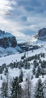 Snowy mountains under a blue sky in a serene winter landscape.