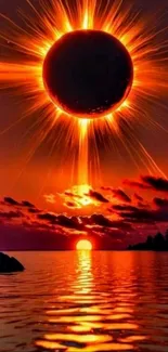 Solar eclipse over a sunset-lit ocean.