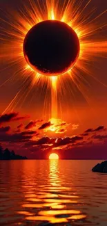 Solar eclipse over a vibrant ocean sunset scene.