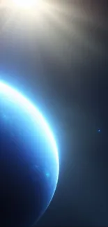 Blue planet illuminated by star in space.