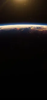 Stunning view of Earth from space at dawn, showcasing a cosmic sunrise.