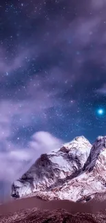 Snow-capped mountains under a starry night sky, perfect for a serene mobile wallpaper.