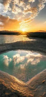 Sunrise over a reflective lake with golden skies, capturing serene natural beauty.