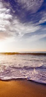 Beautiful sunset beach with waves and colorful sky.