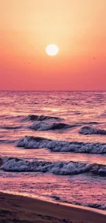 A tranquil sunset over ocean waves with a pink sky in mobile wallpaper.