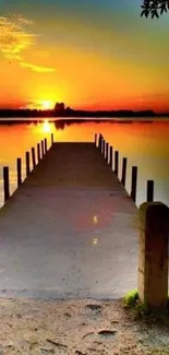 Serene sunset view with dock and reflective water.