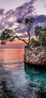 Beautiful island under a vibrant sunset sky over the ocean.