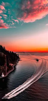 Vibrant sunset over a tranquil ocean with stunning colors.