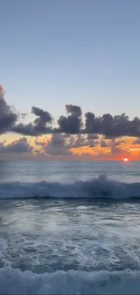 Beautiful ocean sunset with waves and vibrant sky colors.