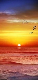 Vibrant ocean sunset with colorful sky and birds flying above waves.