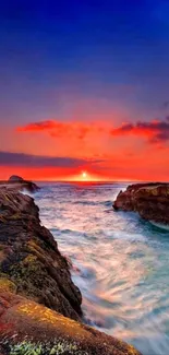 Vibrant sunset over ocean waves with dramatic sky view.