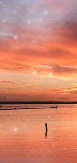 Brilliant orange sunset reflecting on calm waters.