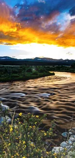 Vibrant sunset over a flowing river with colorful sky and serene landscape.