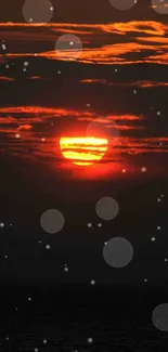 Stunning sunset with dark orange hues against a serene sky for mobile wallpaper.