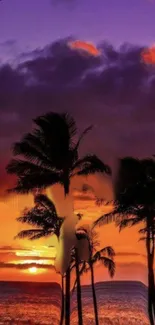 Silhouetted palm trees against vibrant tropical sunset over the ocean.