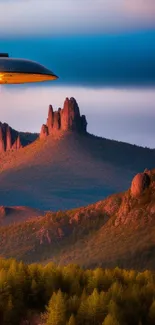 UFO hovering over a scenic mountain landscape at sunset.