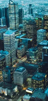 Vibrant city skyline at night with illuminated skyscrapers.