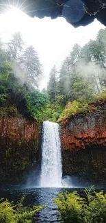 Majestic waterfall surrounded by lush green forest.