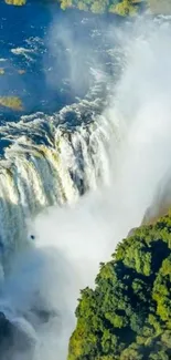 Waterfall cascading over lush green landscape.