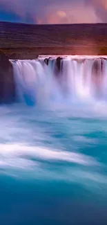 Serene turquoise waterfall mobile wallpaper.