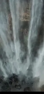 Dynamic waterfall flowing down a rocky cascade.