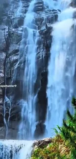 Stunning serene waterfall with cascading water and lush greenery.