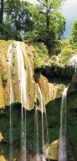 Lush green waterfall landscape with cascading waters.