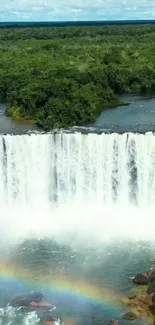 Majestic waterfall with vibrant rainbow on a mobile phone wallpaper.