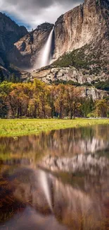 Yosemite National Park waterfall reflecting on a serene lake.