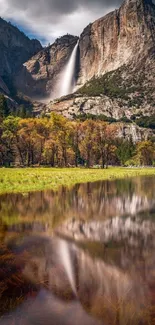 Yosemite waterfall reflecting in a serene, lush landscape.