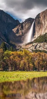 Autumn Yosemite waterfall with vibrant foliage and reflections.