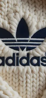 Adidas logo knit design wallpaper.