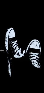 Black wallpaper with white Converse shoes, simple and stylish.