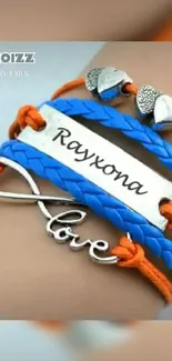 Vibrant blue and orange bracelet with stylish design on wrist.