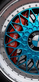 Close-up view of a BMW car wheel with intricate blue and red designs.