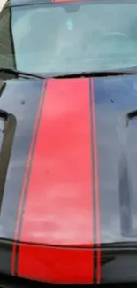 Red stripes on black car hood wallpaper.