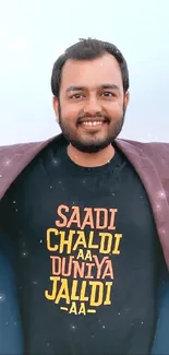 Man in stylish casual attire with a light blue background.