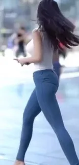 Woman walking in city with stylish outfit and dynamic motion.