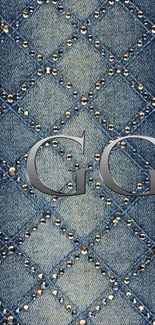 Denim texture wallpaper with diamond patterns and metallic accents.