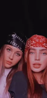 Two fashionable friends wearing bandanas with a stylish aesthetic.