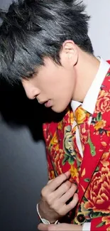 Vibrant floral suit on stylish person with side profile view.