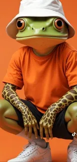 Cartoon frog character wearing an orange shirt and white hat.