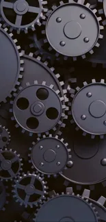 Intricate mechanical gears in black and gray for mobile wallpaper.