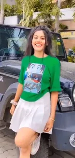 Stylish girl in green shirt beside SUV