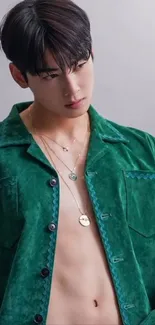 Fashionable portrait with green jacket and necklaces.