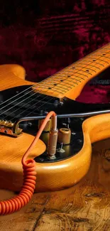 Wooden electric guitar on a vibrant background with coiled cable.