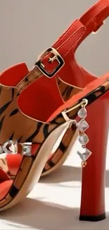 Red and leopard print high-heeled sandals with accessories.